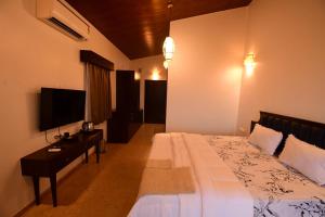 Krevet ili kreveti u jedinici u okviru objekta Waves and Vibes Resort