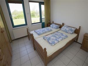 Postel nebo postele na pokoji v ubytování Furnished apartment on the dunes