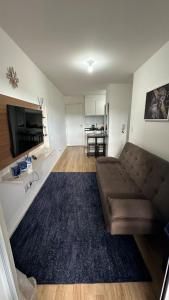 Et tv og/eller underholdning på Apartamento- Pocos de Caldas, MG