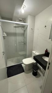 Et badeværelse på Apartamento- Pocos de Caldas, MG