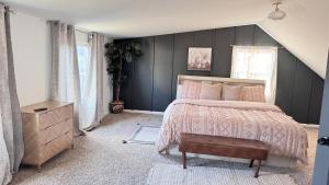 Ένα ή περισσότερα κρεβάτια σε δωμάτιο στο DC Edge stunning three-bedroom House