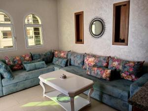 Posezení v ubytování Appartement lumineux avec piscine + 7 fotografií