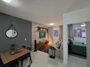 Posezení v ubytování Apto inteiro 1 qto 40 mts Ed Wave Residence Ar condicionado