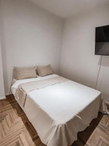 Ένα ή περισσότερα κρεβάτια σε δωμάτιο στο Brown