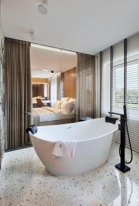 Łóżko lub łóżka w pokoju w obiekcie Hotel Maria