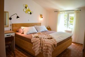 Postel nebo postele na pokoji v ubytování Villa Silencia