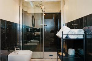 Ein Badezimmer in der Unterkunft La volpe e l'uva Dimore