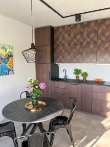 Fotografie z fotogalerie ubytování Wygodny apartament 601, sauna, bilard, siłownia, sala zabaw dla dzieci v Lodži