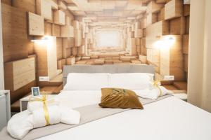 Postel nebo postele na pokoji v ubytování Napolitano Rooms - Central Station