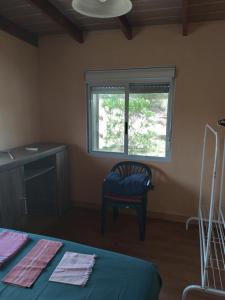 Ένα ή περισσότερα κρεβάτια σε δωμάτιο στο Casa Verde