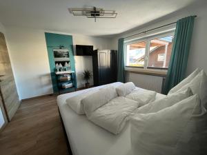 Ein Bett oder Betten in einem Zimmer der Unterkunft Apart Aurelia