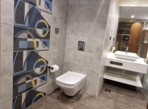 Koupelna v ubytování Phoenix Hotel & Wellness