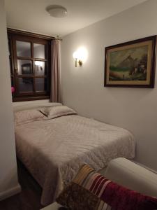 Postel nebo postele na pokoji v ubytování Jovevi Apartments