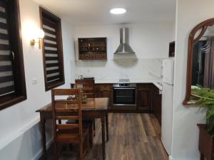 Kuchyň nebo kuchyňský kout v ubytování Jovevi Apartments