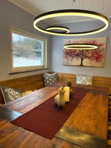 Posezení v ubytování Ferienhaus Waldsiedlung