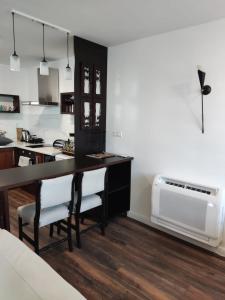 Kuchyň nebo kuchyňský kout v ubytování Jovevi Apartments