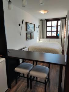 Postel nebo postele na pokoji v ubytování Jovevi Apartments + 19 fotografií