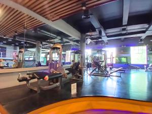 a gym with several different kinds of equipment in it at NAM Kemayoran in Jakarta