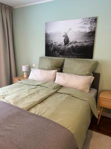 Postel nebo postele na pokoji v ubytování Ferienhaus Waldsiedlung