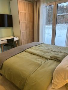 Postel nebo postele na pokoji v ubytování Ferienhaus Waldsiedlung