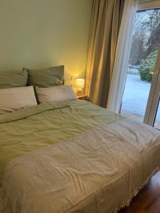 Postel nebo postele na pokoji v ubytování Ferienhaus Waldsiedlung