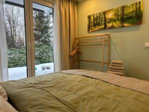Postel nebo postele na pokoji v ubytování Ferienhaus Waldsiedlung