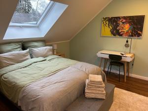 Postel nebo postele na pokoji v ubytování Ferienhaus Waldsiedlung