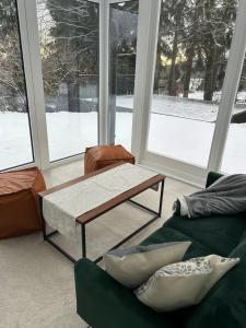 Posezení v ubytování Ferienhaus Waldsiedlung