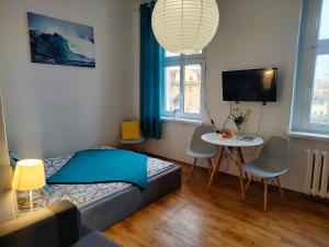 TV a/nebo společenská místnost v ubytování Magnolia Room