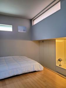 Ένα ή περισσότερα κρεβάτια σε δωμάτιο στο Stay Trinity, a beautiful private house with an architectural award +12 φωτογραφίες