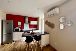 Kuchyňa alebo kuchynka v ubytovaní Casa Zola - T3 - Clim Balcon - Centre Brive