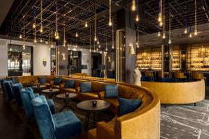 Ein Sitzbereich in der Unterkunft Anantara Grand Hotel Krasnapolsky Amsterdam
