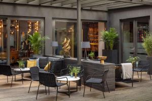 Ein Sitzbereich in der Unterkunft Anantara Grand Hotel Krasnapolsky Amsterdam