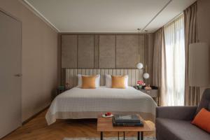 Ein Bett oder Betten in einem Zimmer der Unterkunft Anantara Grand Hotel Krasnapolsky Amsterdam