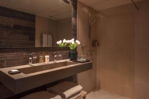Ein Badezimmer in der Unterkunft Anantara Grand Hotel Krasnapolsky Amsterdam