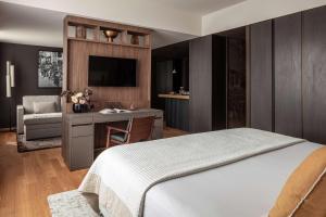Ein Bett oder Betten in einem Zimmer der Unterkunft Anantara Grand Hotel Krasnapolsky Amsterdam