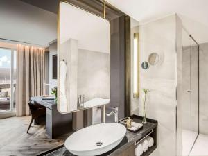 Ein Badezimmer in der Unterkunft Anantara Grand Hotel Krasnapolsky Amsterdam