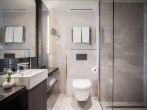 Ein Badezimmer in der Unterkunft Anantara Grand Hotel Krasnapolsky Amsterdam
