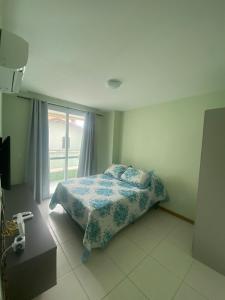 Ένα ή περισσότερα κρεβάτια σε δωμάτιο στο Apartamento em Niterói - Praia Piratininga