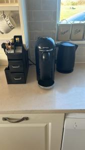 A cozinha ou kitchenette de Coastal View Cottage