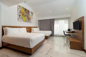 Postel nebo postele na pokoji v ubytování Hotel San Felipe + 29 fotografií