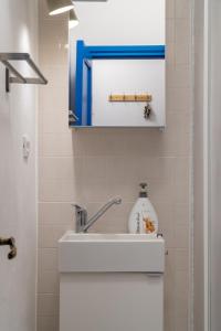 a bathroom with a sink and a mirror at Casa Paradiso in Castronuovo di Sicilia +65 photos