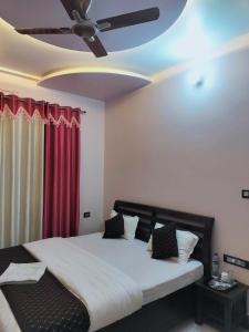 Postel nebo postele na pokoji v ubytování Shree Nanda Guest House