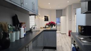 a kitchen with a sink and a counter top at Soho Guest House Room 6 in London