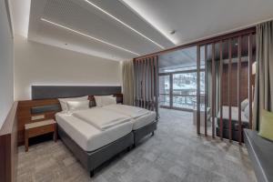 Posteľ alebo postele v izbe v ubytovaní Hotel Rundeck
