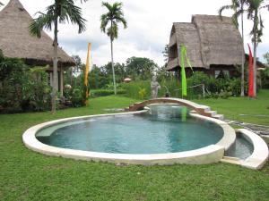 Ubud Hidden Villa Yone village 내부 또는 인근 수영장