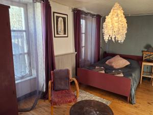 Posteľ alebo postele v izbe v ubytovaní Charmant appartement au cœur des volcans d Auvergne