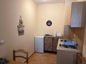 Kuchyň nebo kuchyňský kout v ubytování Minkov Apartments, Замъка 2 + 14 fotografií