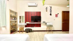 Voodi või voodid majutusasutuse SNUG·NINE Hotel toas