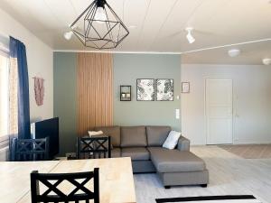 Χώρος καθιστικού στο Cozy apartment with sauna